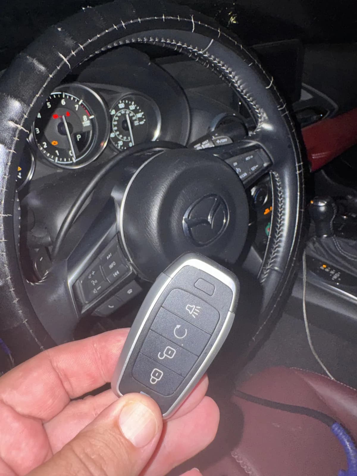 Mazda smart key with remote start programmed on-site during a night call in Charlotte, NC